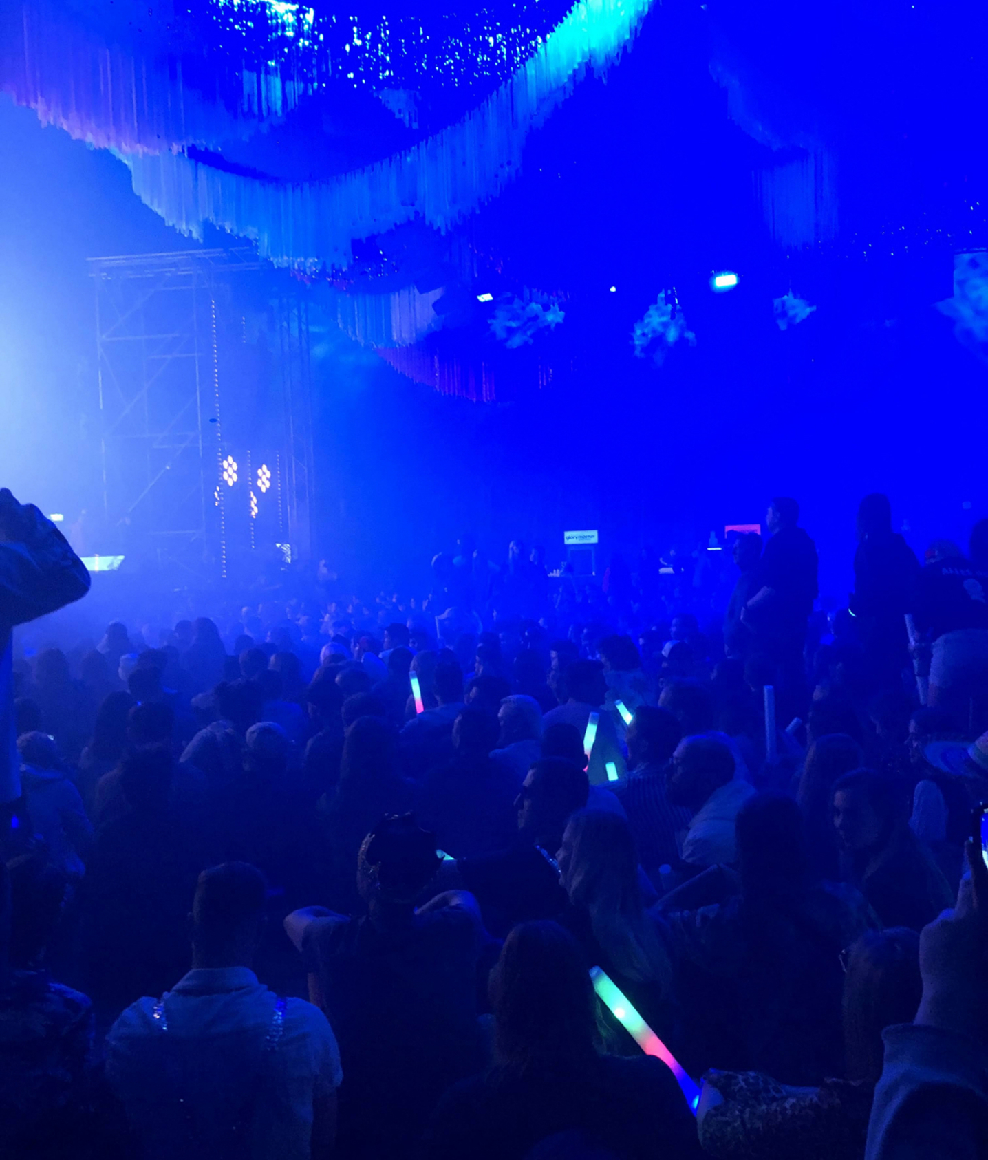 Crowd at the DEPT Weekender under blue lights